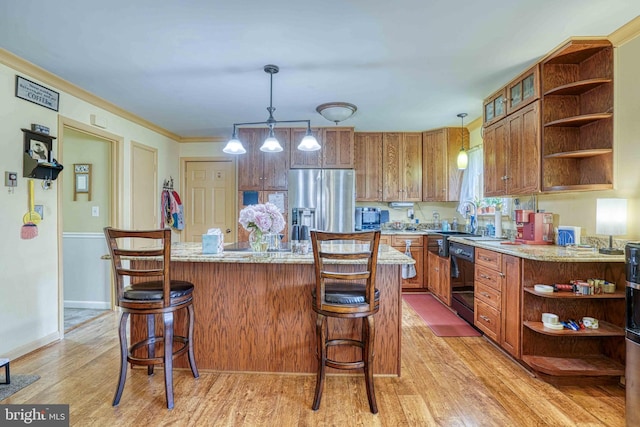 14957 Cherry Ln, Ridgely, MD 21660 - kitchen featuring open shelves, stainless steel fridge, a kitchen island, light wood-style flooring, and crown molding
