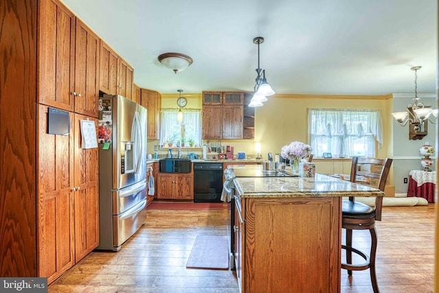 14957 Cherry Ln, Ridgely, MD 21660 - kitchen with stainless steel fridge with ice dispenser, dishwasher, plenty of natural light, a sink, and crown molding