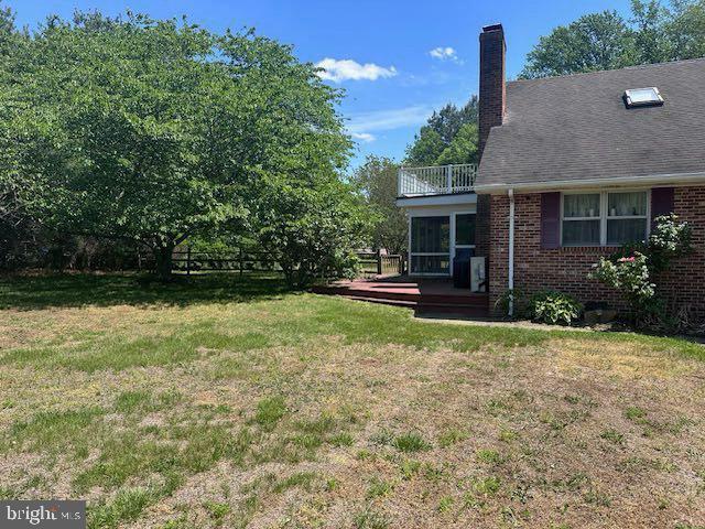 14957 Cherry Ln, Ridgely, MD 21660 - view of yard featuring a balcony and a wooden deck
