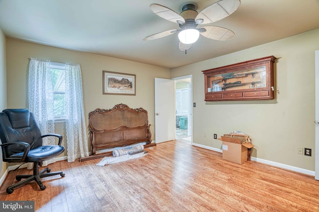 14957 Cherry Ln, Ridgely, MD 21660 - sitting room featuring wood finished floors, baseboards, and a ceiling fan