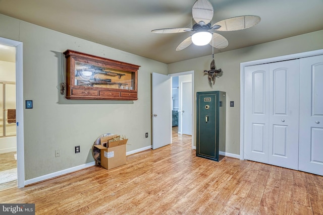 14957 Cherry Ln, Ridgely, MD 21660 - bedroom featuring light wood-style floors, baseboards, a closet, and ceiling fan