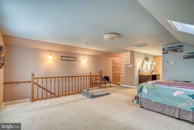 14957 Cherry Ln, Ridgely, MD 21660 - carpeted bedroom with a skylight, baseboards, and lofted ceiling