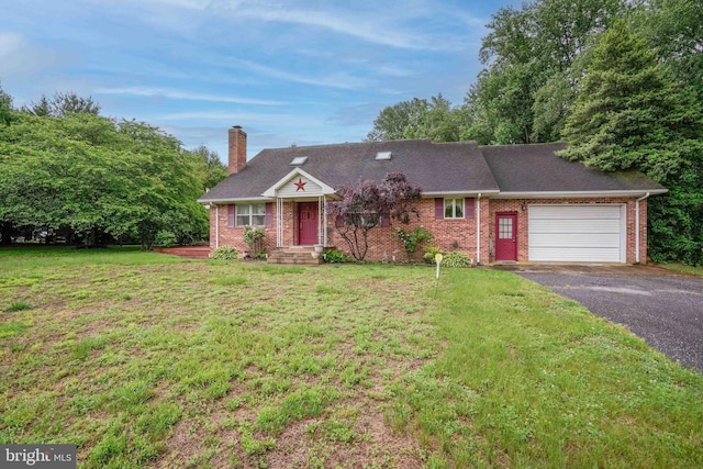 14957 Cherry Ln, Ridgely, MD 21660 - view of front of house with a garage, asphalt driveway, a chimney, brick siding, and a front lawn