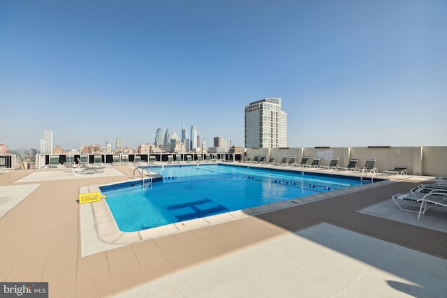 604 S Washington Sq Unit 1408, Philadelphia, PA 19106 - community pool with a patio area and a view of skyline