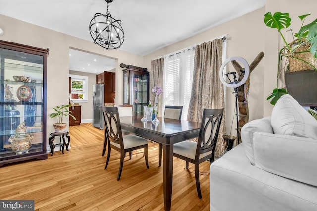 2812 Kildaire Dr, Baltimore, MD 21234 - dining space with light wood-style flooring, a chandelier, baseboards, and recessed lighting