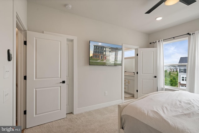 17303 Turnstone Dr, Dumfries, VA 22026 - bedroom with light carpet, baseboards, connected bathroom, a ceiling fan, and recessed lighting