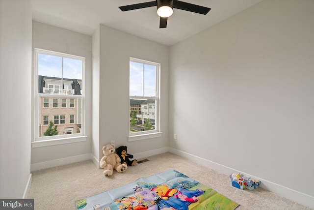 17303 Turnstone Dr, Dumfries, VA 22026 - playroom featuring carpet floors, baseboards, and a ceiling fan