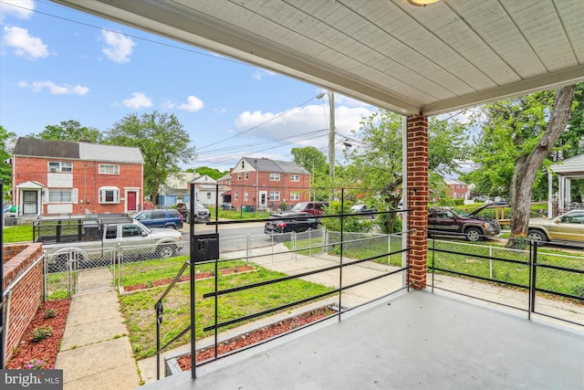 6023 20th Ave, Hyattsville, MD 20782 - view of patio featuring a residential view and fence