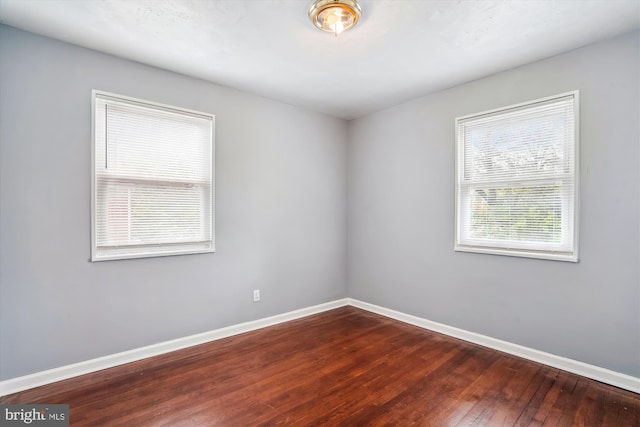 6023 20th Ave, Hyattsville, MD 20782 - spare room featuring baseboards and hardwood / wood-style floors