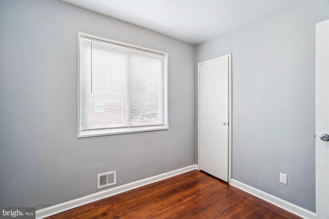 6023 20th Ave, Hyattsville, MD 20782 - empty room featuring baseboards and wood finished floors