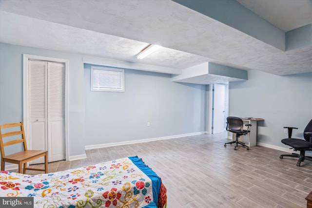 6023 20th Ave, Hyattsville, MD 20782 - bedroom featuring baseboards, wood finished floors, and a closet