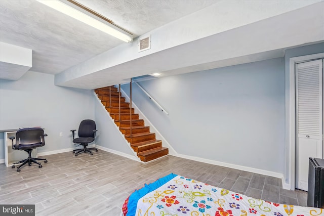 6023 20th Ave, Hyattsville, MD 20782 - recreation room featuring baseboards and wood finished floors