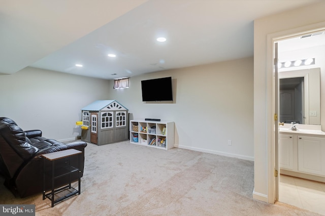 playroom with baseboards, carpet flooring, recessed lighting, and a sink