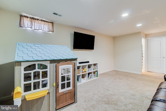 interior space featuring carpet flooring, visible vents, baseboards, and recessed lighting