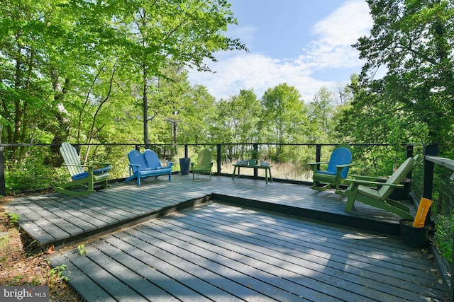 deck with view of wooded area