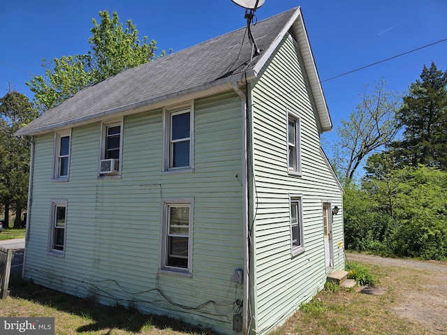 32939 Old Ocean City Rd, Parsonsburg, MD 21849 - view of home's exterior featuring a shingled roof and cooling unit