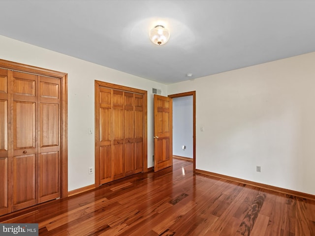 12553 Fawn Dr, Laurel, DE 19956 - unfurnished bedroom featuring baseboards and wood finished floors