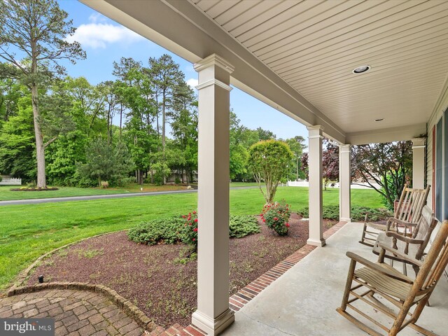12553 Fawn Dr, Laurel, DE 19956 - view of patio / terrace featuring covered porch and view of scattered trees