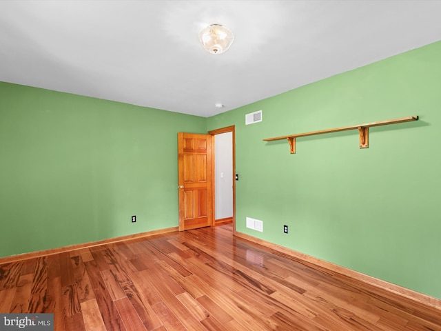12553 Fawn Dr, Laurel, DE 19956 - unfurnished room featuring wood finished floors and baseboards