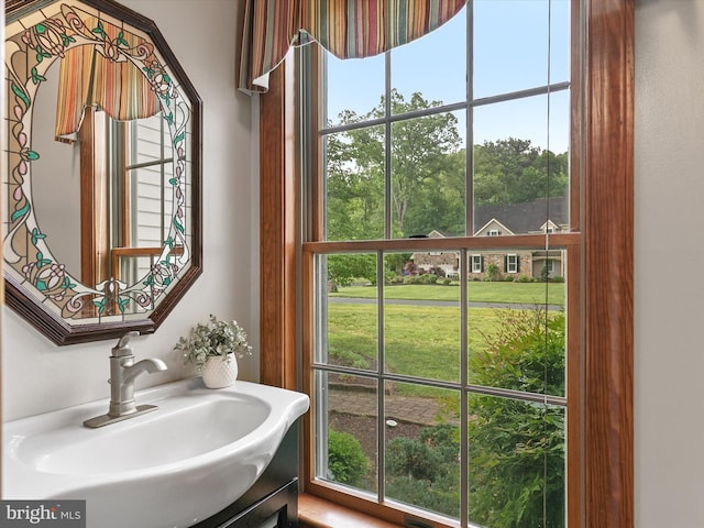 12553 Fawn Dr, Laurel, DE 19956 - bathroom featuring a sink and plenty of natural light