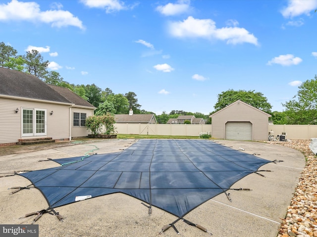 12553 Fawn Dr, Laurel, DE 19956 - view of swimming pool with a fenced backyard, an outdoor structure, and a patio area