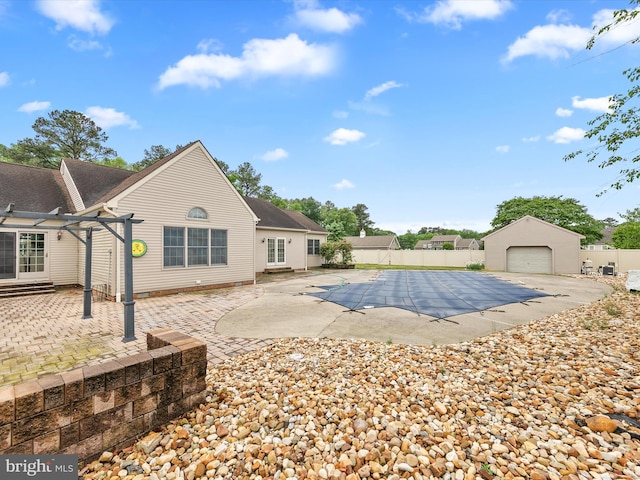 12553 Fawn Dr, Laurel, DE 19956 - view of pool featuring fence, a patio area, and an outdoor structure