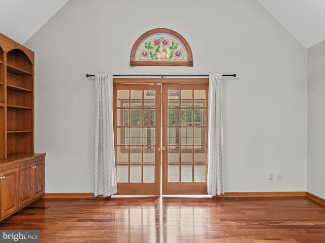 12553 Fawn Dr, Laurel, DE 19956 - doorway featuring french doors, wood finished floors, baseboards, and high vaulted ceiling