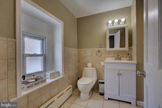 4324 Cresson St, Philadelphia, PA 19127 - bathroom featuring tile patterned flooring, vanity, toilet, tile walls, and a baseboard heating unit
