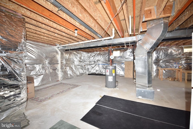 unfinished below grade area featuring electric water heater