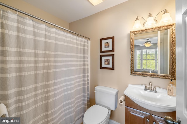 full bathroom with vanity and toilet