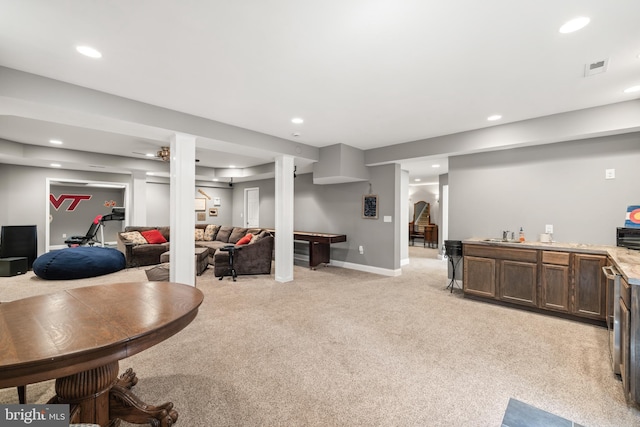 interior space with baseboards, visible vents, recessed lighting, and light colored carpet