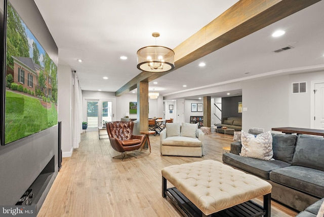 12019 Wandabury Rd, Oakton, VA 22124 - living area featuring light wood-style flooring, recessed lighting, stairs, and a chandelier