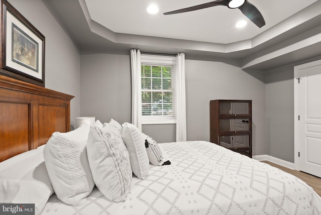 12019 Wandabury Rd, Oakton, VA 22124 - bedroom with wood finished floors, baseboards, ceiling fan, recessed lighting, and a tray ceiling