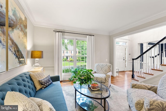 12019 Wandabury Rd, Oakton, VA 22124 - living area featuring ornamental molding, wood finished floors, and stairway