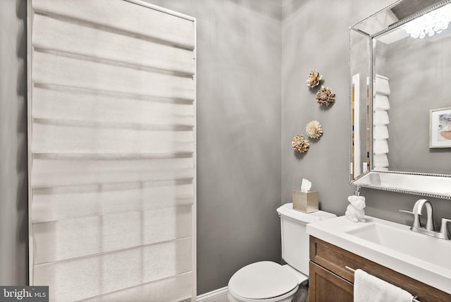 12019 Wandabury Rd, Oakton, VA 22124 - bathroom with vanity and toilet