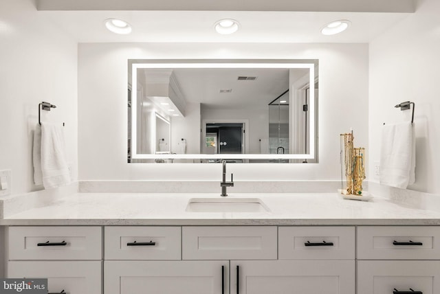 12019 Wandabury Rd, Oakton, VA 22124 - bathroom featuring vanity and recessed lighting