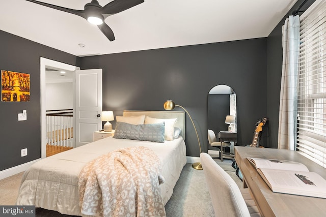 12019 Wandabury Rd, Oakton, VA 22124 - carpeted bedroom featuring baseboards, arched walkways, and ceiling fan