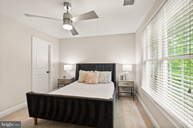 12019 Wandabury Rd, Oakton, VA 22124 - bedroom with light colored carpet, baseboards, and a ceiling fan
