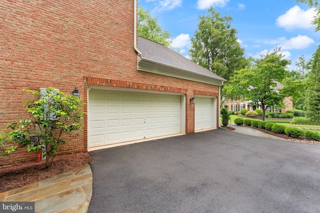 12019 Wandabury Rd, Oakton, VA 22124 - garage with asphalt driveway
