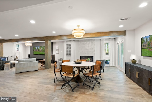 12019 Wandabury Rd, Oakton, VA 22124 - dining area with light wood-style floors, recessed lighting, and a fireplace