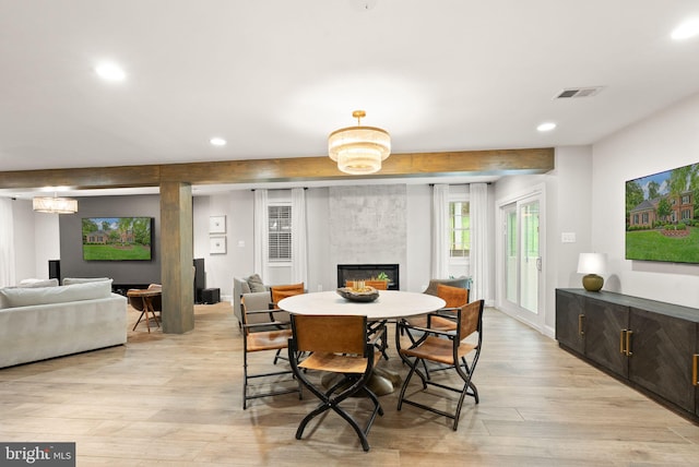 12019 Wandabury Rd, Oakton, VA 22124 - dining area featuring light wood-style flooring, recessed lighting, and a fireplace