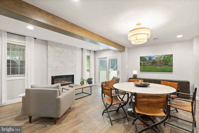12019 Wandabury Rd, Oakton, VA 22124 - dining room featuring a large fireplace, recessed lighting, and light wood-type flooring