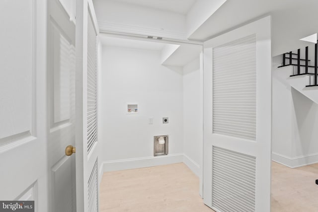 laundry room featuring baseboards, hookup for an electric dryer, laundry area, and hookup for a washing machine