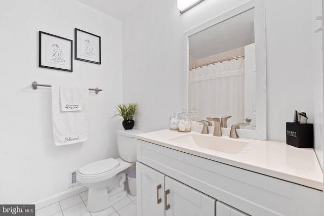 full bathroom with vanity, toilet, tile patterned floors, baseboards, and visible vents