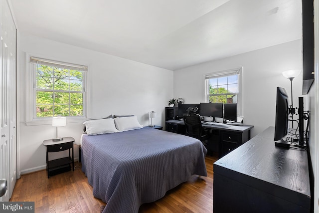 bedroom featuring wood finished floors