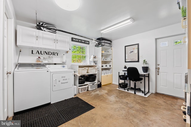 washroom featuring cabinet space and washing machine and clothes dryer