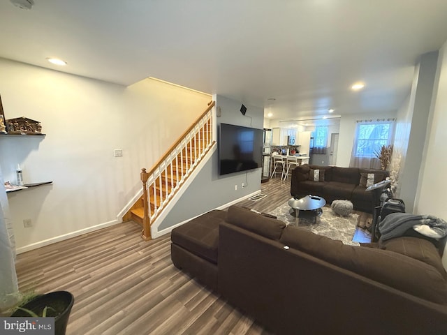 653 N 37th St, Philadelphia, PA 19104 - living area featuring recessed lighting, baseboards, stairs, and wood finished floors