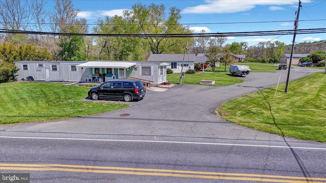 view of front of home with a front lawn