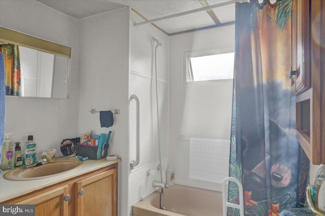 bathroom featuring vanity and shower / washtub combination