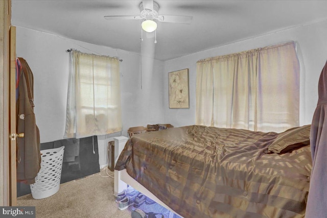 bedroom with carpet flooring and a ceiling fan